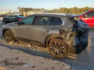 2023 Mazda CX-50 S Premium Plus with VIN 7MMVABEM3PN102285, listed as a Copart auction lot 77684064 with 14,190 mi miles and Salvage Title. Bid and sale history available at DreamBid. Image 2.
