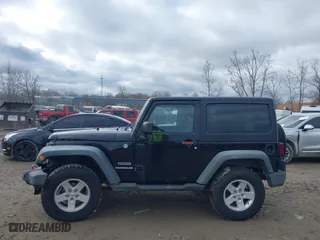2011 Jeep Wrangler Sport with VIN 1J4AA2D1XBL634783, listed as a IAAI auction lot 41928702 with 154,379 mi miles. Bid and sale history available at carsss.com. Image 14.