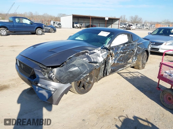 2018 Ford Mustang GT z VIN 1FA6P8CF4J5158775, wystawiony jako IAAI lot #41627780 z przebiegiem 65 519 mil mil oraz . Historia ofert i sprzedaży dostępna na DreamBid. Obrazek 2.