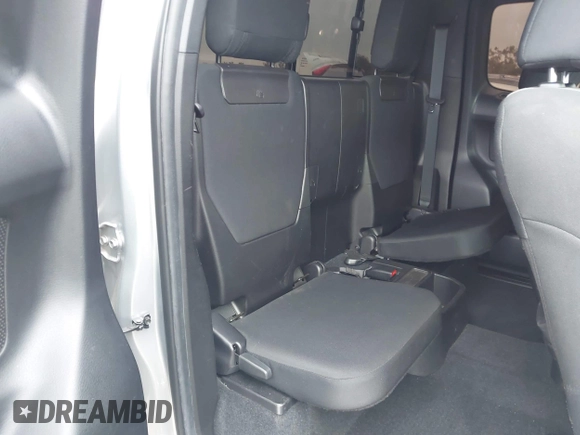 2022 Toyota Tacoma SR with VIN 3TYRZ5CN9NT022492, listed as a IAAI auction lot 42378801 with 9,312 mi miles and . Bid and sale history available at DreamBid. Image 8.