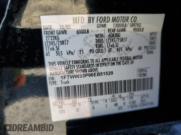 2006 Ford F-350 XL with VIN 1FTWW33P96EB51529, listed as a Copart auction lot 46811995 with 142,185 mi miles and Salvage title. Bid and sale history available at DreamBid. Image 12.