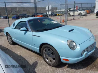 2003 Ford Thunderbird Deluxe z VIN 1FAHP60A53Y101461, wystawiony jako IAAI lot #42519933 z przebiegiem 64 820 mil mil oraz . Historia ofert i sprzedaży dostępna na DreamBid. Obrazek 13.