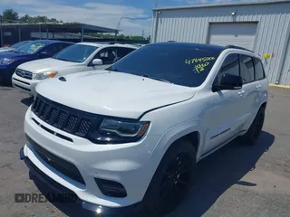 2019 Jeep Grand Cherokee Summit with VIN 1C4RJFJT1KC785744, listed as a IAAI auction lot 42645006 with 38,483 mi miles and . Bid and sale history available at DreamBid. Image 2.