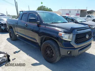 2019 Toyota Tundra SR with VIN 5TFUY5F13KX852912, listed as a IAAI auction lot 42327399 with 124,193 mi miles and . Bid and sale history available at DreamBid. Image 1.