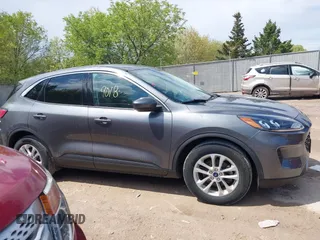 2021 Ford Escape SE Hybrid z VIN 1FMCU0BZ8MUA09021, wystawiony jako IAAI lot #42229018 z przebiegiem 62 265 mil mil oraz . Historia ofert i sprzedaży dostępna na DreamBid. Obrazek 13.
