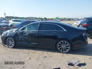 2018 Lincoln MKZ Select z VIN 3LN6L5C90JR625598, wystawiony jako IAAI lot #42189498 z przebiegiem 98 803 mil mil oraz . Historia ofert i sprzedaży dostępna na DreamBid. Obrazek 13.