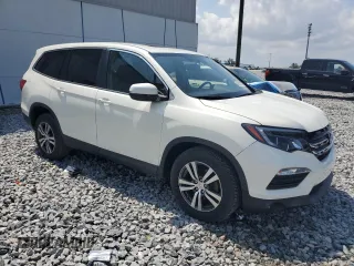 2018 Honda Pilot EX-L with VIN 5FNYF6H51JB014013, listed as a Copart auction lot 55892275 with 54,267 mi miles and Clean Title. Bid and sale history available at DreamBid. Image 4.