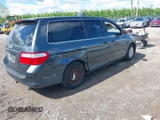 2005 Honda Odyssey LX z VIN 5FNRL38205B128740, wystawiony jako IAAI lot #42209974 z przebiegiem 183 014 mil mil oraz . Historia ofert i sprzedaży dostępna na DreamBid. Obrazek 4.