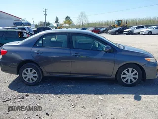 2011 Toyota Corolla L with VIN JTDBU4EE4B9144190, listed as a IAAI auction lot 42060728 with 115,299 mi miles. Bid and sale history available at carsss.com. Image 13.