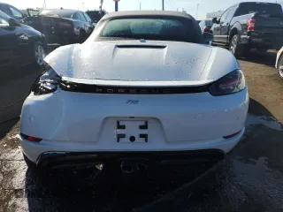 2017 Porsche 718 Boxster z VIN WP0CA2A89HS221297, wystawiony jako Copart lot #68283993 z przebiegiem 9668 mil mil oraz . Historia ofert i sprzedaży dostępna na DreamBid. Obrazek 6.