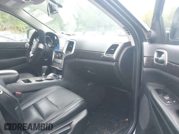 2011 Jeep Grand Cherokee Laredo with VIN 1J4RR4GGXBC604304, listed as a IAAI auction lot 42201742 with 196,483 mi miles and . Bid and sale history available at DreamBid. Image 5.