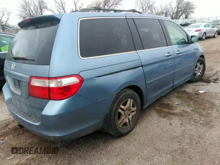 2006 Honda Odyssey EX with VIN 5FNRL38436B086177, listed as a IAAI auction lot 41219596 with 123,455 mi miles. Bid and sale history available at carsss.com. Image 4.