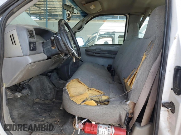 2001 Ford F-250 with VIN 3FTNX21L21MA60236, listed as a Copart auction lot 74987434 with 147,175 mi miles and Salvage title. Bid and sale history available at DreamBid. Image 7.