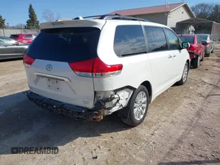 2014 Toyota Sienna Ltd with VIN 5TDDK3DC0ES090160, listed as a IAAI auction lot 41763998 with 160,508 mi miles. Bid and sale history available at carsss.com. Image 4.