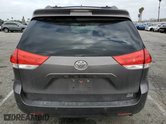 2014 Toyota Sienna Limited с VIN 5TDDK3DC6ES084587, выставлен на аукционе Copart как лот 62018095 с пробегом 152 124 миль миль и Списание • Salvage title. История ставок и продаж доступна на DreamBid. Изображение 6.