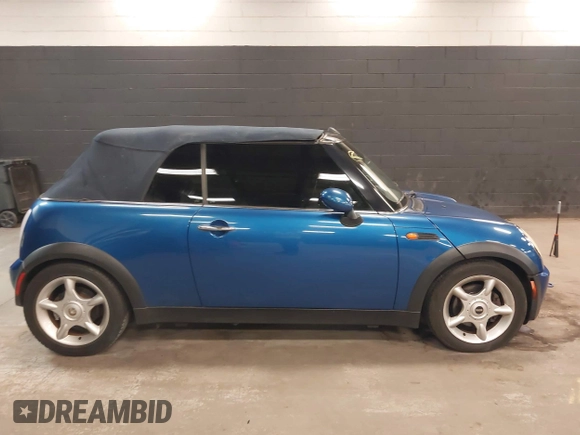 2005 MINI Convertible with VIN WMWRF33555TF63632, listed as a IAAI auction lot 42166640 with 102,559 mi miles and . Bid and sale history available at DreamBid. Image 13.