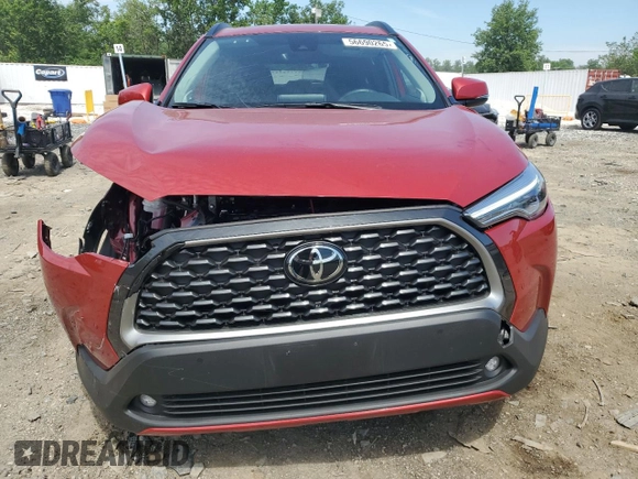 2022 Toyota Corolla Cross XLE with VIN 7MUDAABG5NV005882, listed as a Copart auction lot 56690265 with 6,427 mi miles and Salvage title. Bid and sale history available at DreamBid. Image 5.