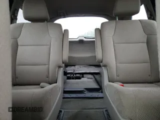 2014 Honda Odyssey LX z VIN 5FNRL5H24EB098072, wystawiony jako Copart lot #57577385 z przebiegiem 215 069 mil mil oraz Szkoda całkowita • Salvage title. Historia ofert i sprzedaży dostępna na DreamBid. Obrazek 10.