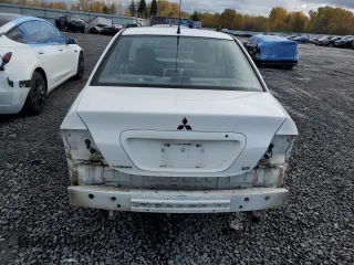 2005 Mitsubishi Lancer ES with VIN JA3AJ26E55U036958, listed as a Copart auction lot 79773814 with 215,965 mi miles and Salvage Title. Bid and sale history available at carsss.com. Image 6.