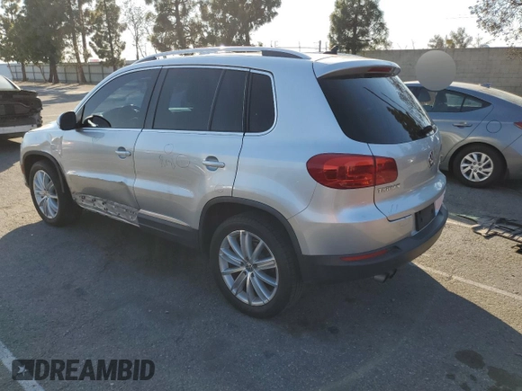 2013 Volkswagen Tiguan S with VIN WVGAV7AX8DW501081, listed as a Copart auction lot 88065365 with 157,312 mi miles and Salvage title. Bid and sale history available at DreamBid. Image 2.