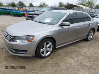 2013 Volkswagen Passat SE w/Sunroof & Nav with VIN 1VWBP7A30DC112563, listed as a IAAI auction lot 41917390 with 222,008 mi miles. Bid and sale history available at carsss.com. Image 2.