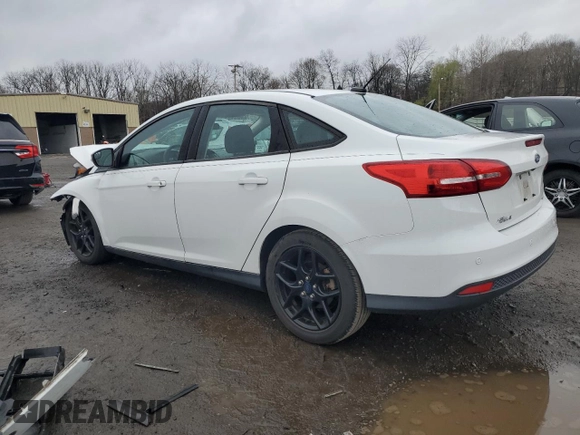 2016 Ford Focus SE z VIN 1FADP3F2XGL223796, wystawiony jako Copart lot #52567505 z przebiegiem Nie podano mil oraz Szkoda całkowita • Salvage title. Historia ofert i sprzedaży dostępna na DreamBid. Obrazek 2.