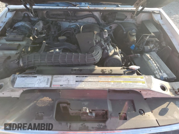 1999 Ford Explorer XL z VIN 1FMZU34XXXUB80803, wystawiony jako Copart lot #87027834 z przebiegiem 222 864 mil mil oraz Szkoda całkowita • Salvage title. Historia ofert i sprzedaży dostępna na DreamBid. Obrazek 11.