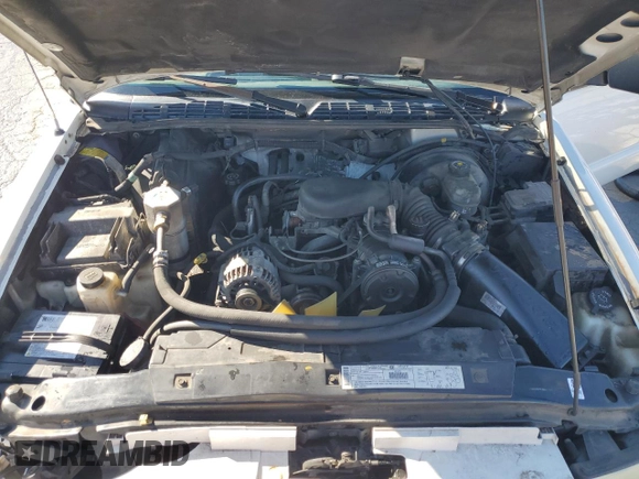 2001 GMC Sonoma SLS 1SG z VIN 1GTCS19W118257613, wystawiony jako Copart lot #46504385 z przebiegiem 217 842 mil mil oraz Szkody całkowita. Historia ofert i sprzedaży dostępna na DreamBid. Obrazek 11.