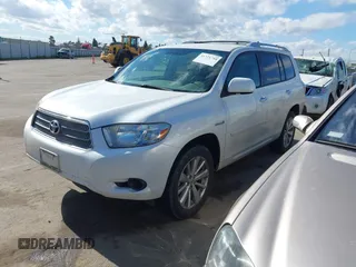 2010 Toyota Highlander Hybrid with VIN JTEBW3EH3A2043210, listed as a IAAI auction lot 41721744 with 243,246 mi miles. Bid and sale history available at carsss.com. Image 21.