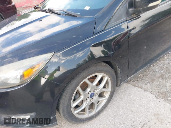 2015 Ford Focus SE with VIN 1FADP3K2XFL319559, listed as a IAAI auction lot 42205107 with 184,499 mi miles. Bid and sale history available at carsss.com. Image 13.