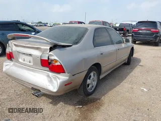 1997 Honda Accord Special Edition with VIN 1HGCD5609VA053062, listed as a IAAI auction lot 41956666 with 217,186 mi miles and . Bid and sale history available at carsss.com. Image 4.