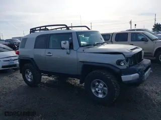 2010 Toyota FJ Cruiser with VIN JTEBU4BF6AK096501, listed as a IAAI auction lot 41413287 with 236,788 mi miles. Bid and sale history available at carsss.com. Image 1.