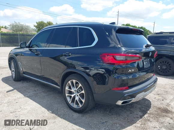 2019 BMW X5 xDrive40i with VIN 5UXCR6C59KLL23735, listed as a IAAI auction lot 41999791 with 31,072 mi miles. Bid and sale history available at carsss.com. Image 3.