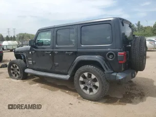 2018 Jeep Wrangler Unlimited Sahara with VIN 1C4HJXEG0JW141101, listed as a Copart auction lot 56573195 with 143,854 mi miles and Salvage title. Bid and sale history available at DreamBid. Image 2.