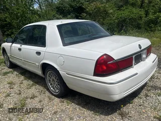 2000 Mercury Grand Marquis GS z VIN 2MEFM74W2YX675365, wystawiony jako Copart lot #58024375 z przebiegiem 35 499 mil mil oraz Czysty tytuł • Clean title. Historia ofert i sprzedaży dostępna na DreamBid. Obrazek 3.