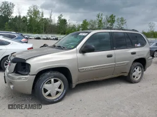 2002 GMC Envoy SLT z VIN 1GKDT13S022375488, wystawiony jako Copart lot #61462745 z przebiegiem 145 914 mil mil oraz Czysty tytuł • Clean title. Historia ofert i sprzedaży dostępna na DreamBid. Obrazek 1.