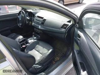 2010 Mitsubishi Lancer GTS with VIN JA32X8HWXAU010281, listed as a IAAI auction lot 41675417 with 101,502 mi miles. Bid and sale history available at carsss.com. Image 5.