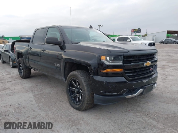 2017 Chevrolet Silverado 1500 LT with VIN 1GCUKREC2HF208232, listed as a IAAI auction lot 40933445 with 105,928 mi miles and . Bid and sale history available at DreamBid. Image 1.