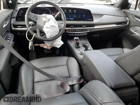 2024 Cadillac XT4 AWD Premium Luxury with VIN 1GYFZDR40RF123637, listed as a Copart auction lot 46852195 with 5,001 mi miles and Salvage title. Bid and sale history available at DreamBid. Image 8.