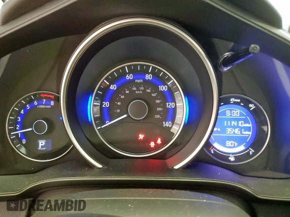 2015 Honda Fit EX-L z VIN 3HGGK5H88FM701702, wystawiony jako Copart lot #56390935 z przebiegiem 111 410 mil mil oraz Szkoda całkowita • Salvage title. Historia ofert i sprzedaży dostępna na DreamBid. Obrazek 9.