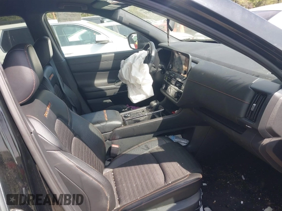 2023 Nissan Pathfinder Rock Creek with VIN 5N1DR3BD2PC256136, listed as a IAAI auction lot 41909614 with 39,429 mi miles and . Bid and sale history available at DreamBid. Image 5.