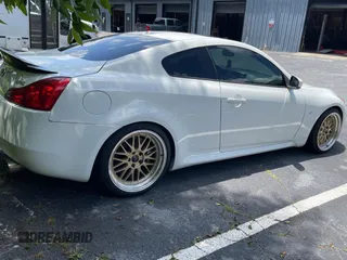 2014 Infiniti Q60 Journey с VIN JN1CV6EKXEM110777, выставлен на аукционе Copart как лот 60266245 с пробегом 128 272 миль миль и Чистый • Clean title. История ставок и продаж доступна на DreamBid. Изображение 4.