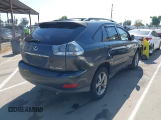 2006 Lexus RX 400h with VIN JTJHW31U560009707, listed as a IAAI auction lot 42148672 with 198,569 mi miles and . Bid and sale history available at DreamBid. Image 4.