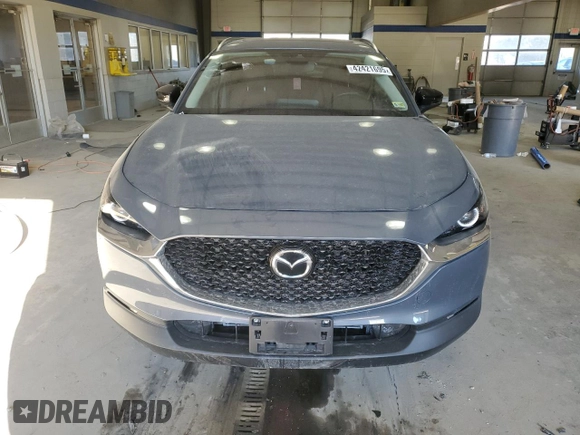 2022 Mazda CX-30 S Carbon Edition с VIN 3MVDMBCL7NM429131, выставлен на аукционе Copart как лот 42421695 с пробегом 21 825 миль миль и Списание • Salvage title. История ставок и продаж доступна на DreamBid. Изображение 5.