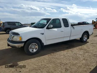 1999 Ford F-150 with VIN 2FTRX17L0XCA37979, listed as a Copart auction lot 58216695 with 256,055 mi miles and Clean title. Bid and sale history available at DreamBid. Image 1.