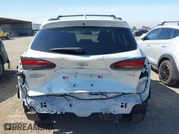 2022 Toyota Corolla Cross XLE with VIN 7MUEAAAG4NV027314, listed as a IAAI auction lot 42701907 with 30,275 mi miles and . Bid and sale history available at DreamBid. Image 17.