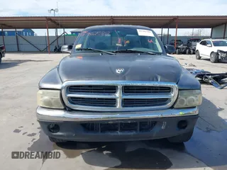 2001 Dodge Dakota z VIN 1B7HL2AX51S333575, wystawiony jako IAAI lot #41782582 z przebiegiem 291 640 mil mil oraz . Historia ofert i sprzedaży dostępna na DreamBid. Obrazek 12.