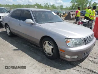 1998 Lexus LS 400 with VIN JT8BH28F1W0101562, listed as a IAAI auction lot 42263258 with 82,090 mi miles and . Bid and sale history available at DreamBid. Image 1.