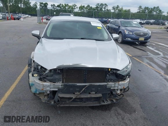 2017 Ford Fusion Hybrid SE with VIN 3FA6P0LU2HR317784, listed as a IAAI auction lot 42618554 with 114,814 mi miles and . Bid and sale history available at DreamBid. Image 13.