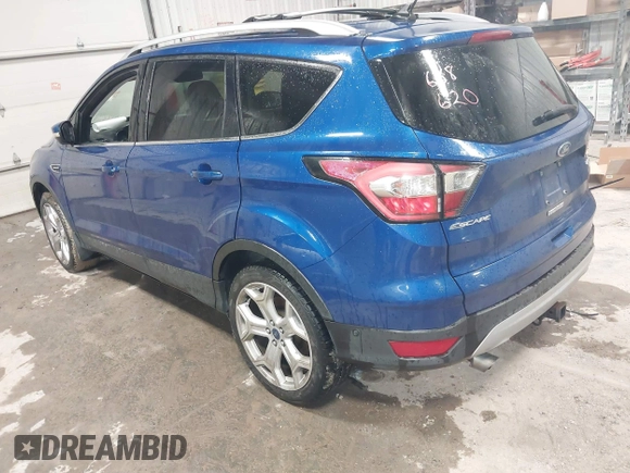 2018 Ford Escape Titanium with VIN 1FMCU9J99JUB94925, listed as a IAAI auction lot 42412800 with 95,880 mi miles and . Bid and sale history available at DreamBid. Image 3.